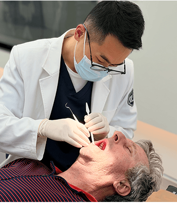 Dentist performing a carefully planned implant procedure